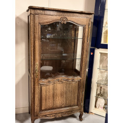 Argentier ouvrant à une porte vitrée, de