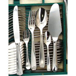 Ménagère en inox décor coquille comprena