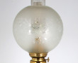 Lampe à pétrole en verre noir et bronze,