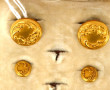 Paire de boutons de manchette et une pai