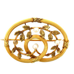 Petite broche ancienne en or jaune 18 ct