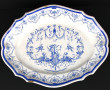 Plat ancien en faïence à bords contours,