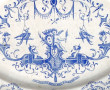 Plat ancien en faïence à bords contours,