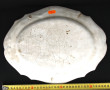 Plat ancien en faïence à bords contours,