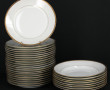 LIMOGES - Ensemble d'assiettes en porcel