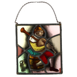 Petit vitrail à décor d'un joueur de cor