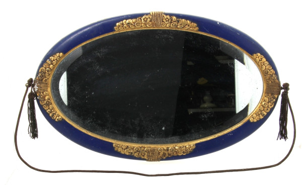 Miroir de forme ovale, circa 1925, à déc