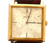 OMEGA - Montre boitier carré plaqué or 