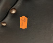 Fauteuil des années 50 en skaï noir clou
