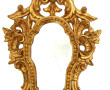 Miroir rocaille en bois doré H. 63 cm (u