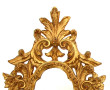 Miroir rocaille en bois doré H. 63 cm (u