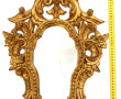 Miroir rocaille en bois doré H. 63 cm (u
