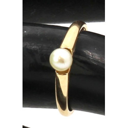 Bague en or jaune 750ème sertie d'une pe