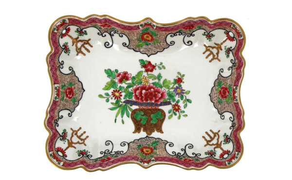 Petit plat creux en porcelaine à décor f