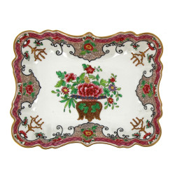 Petit plat creux en porcelaine à décor f