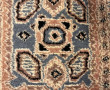 Petit tapis laine points noués dans les 