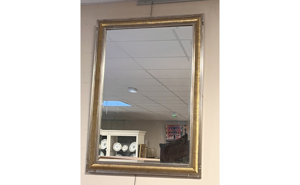Beau miroir moderne bordure argentée et 