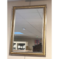 Beau miroir moderne bordure argentée et 