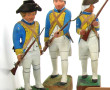 8 soldats en bois peints H. 26 cm