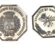 QUATRE JETONS d'ARGENT de forme octogona