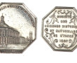 QUATRE JETONS d'ARGENT de forme octogona