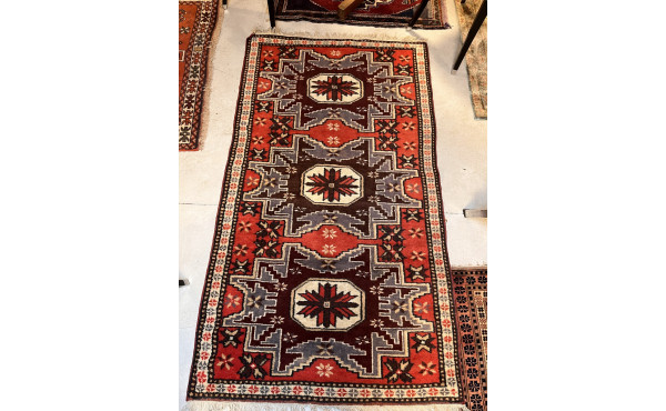 Tapis en laine points noués dans les ton