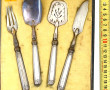 4 petits couverts de service, manches ar