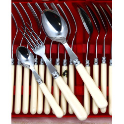 Ménagère vintage, neuve, en inox et manc