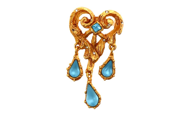 Christian Lacroix, broche en métal doré 