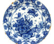 DELFT XVIIIème - Assiette à décor floral