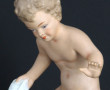 Groupe en porcelaine et biscuit, figuran