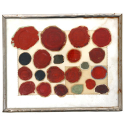 Cadre contenant un ensemble de 21 cachet