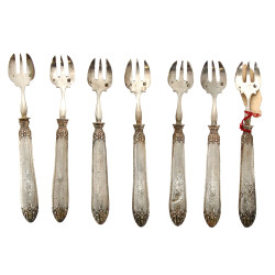 7 fourchettes à huîtres en argent et arg