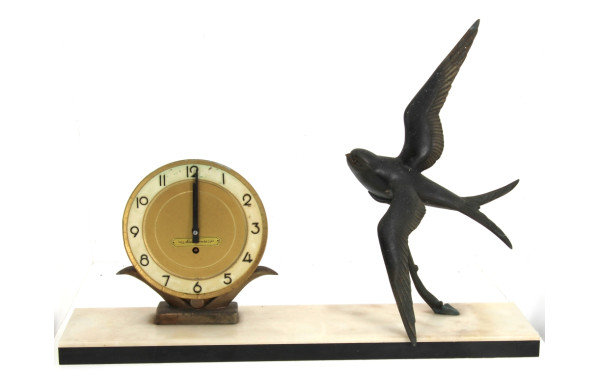 Pendule à l'hirondelle, vers 1950, métal