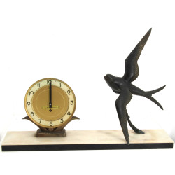 Pendule à l'hirondelle, vers 1950, métal
