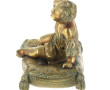 "Enfant au coussin", presse-papier en br