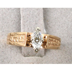 Bague en or jaune travaillé 18 cts serti