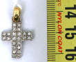Pendentif croix deux ors 18 cts serti d'