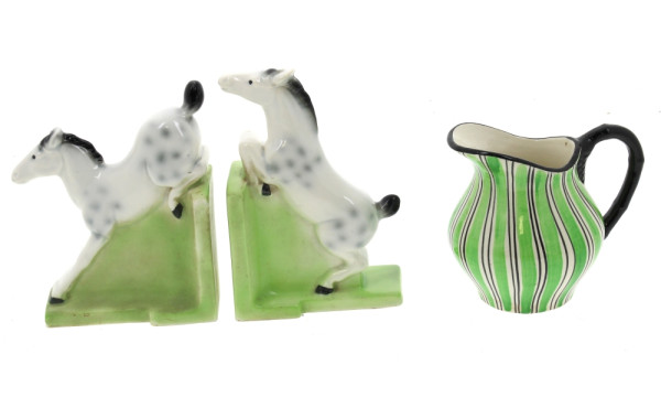 Paire de serre-livres en porcelaine à dé