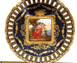 Assiette en porcelaine bleu de four et o