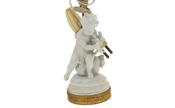 Petite figurine en porcelaine et tissu, 
