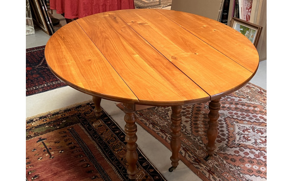 Table ancienne en bois fruitier, à deux 