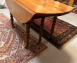 Table ancienne en bois fruitier, à deux 