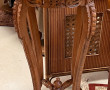 Selette en bois naturel sculptée ajourée