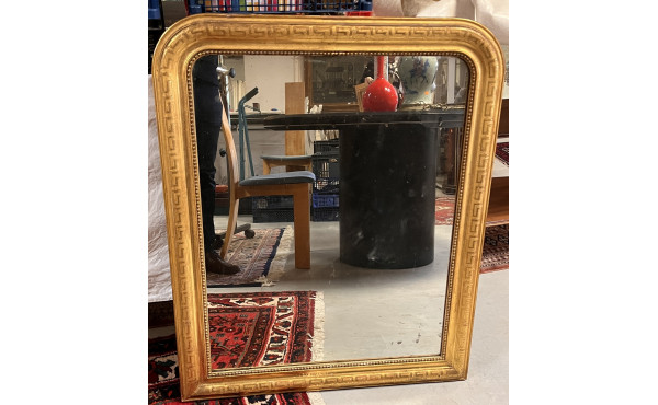 Miroir doré fin XIXe décor de frise à la
