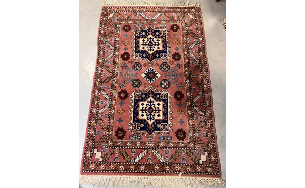Tapis en laine points noués dans les ton