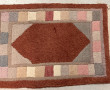 Lot de 4 petits tapis en laine à décor g