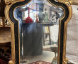 Miroir rocaille noir et or dans le goût 