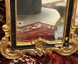 Miroir rocaille noir et or dans le goût 