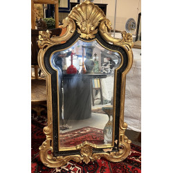 Miroir rocaille noir et or dans le goût 